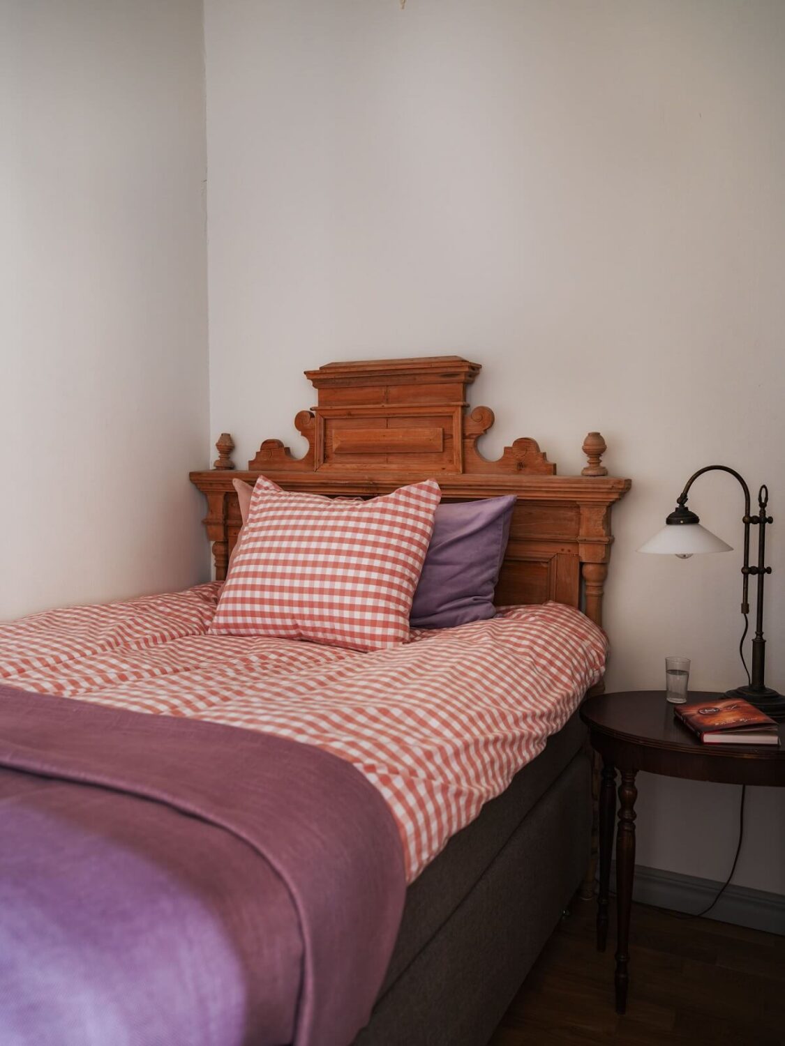 A Tiny Apartment with Antique Furniture 15 tiny bedroom with antique wooden bed