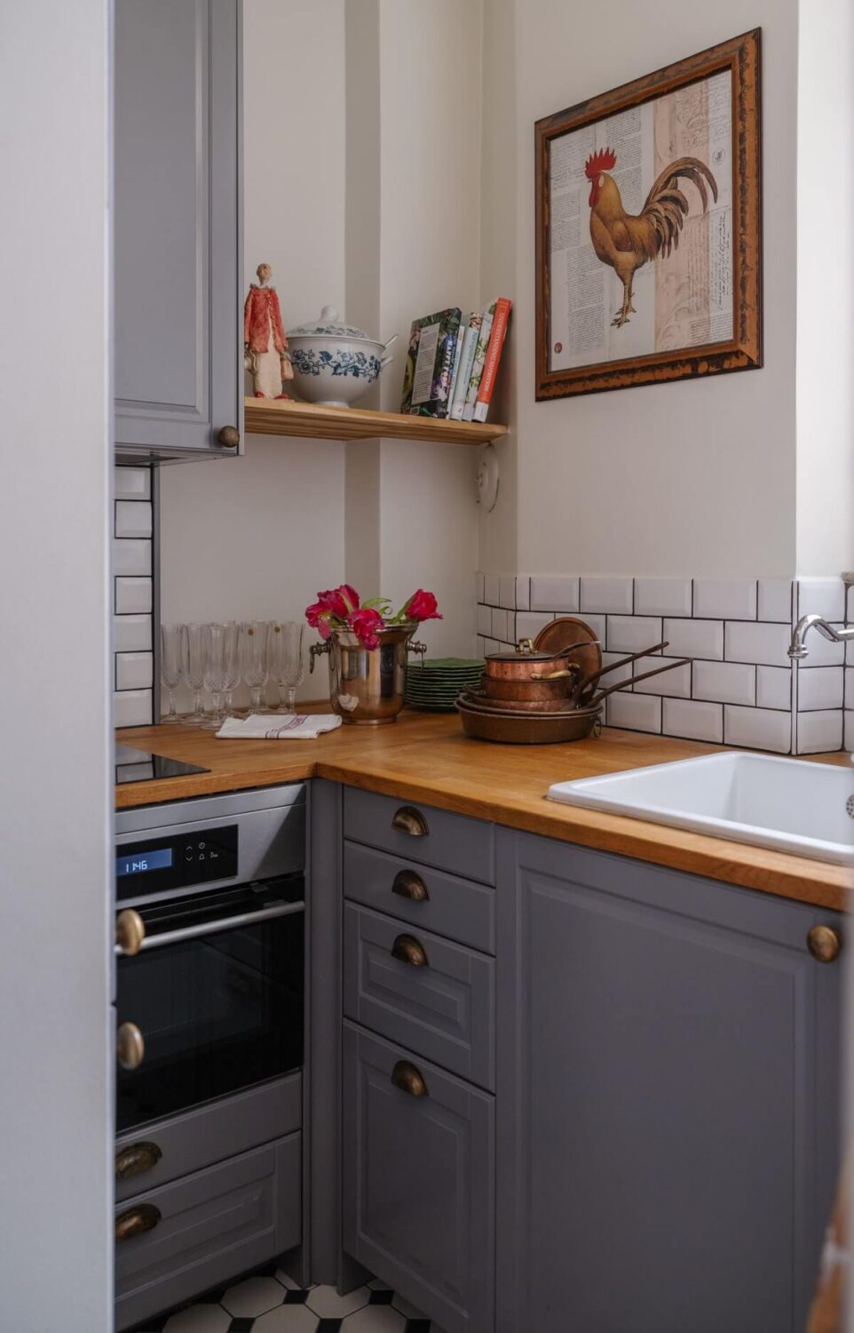 Small Space, Big Style: How to Design a Teeny-Tiny Kitchen That Works 2 tiny gray kitchen with classic black and white floor nordroom