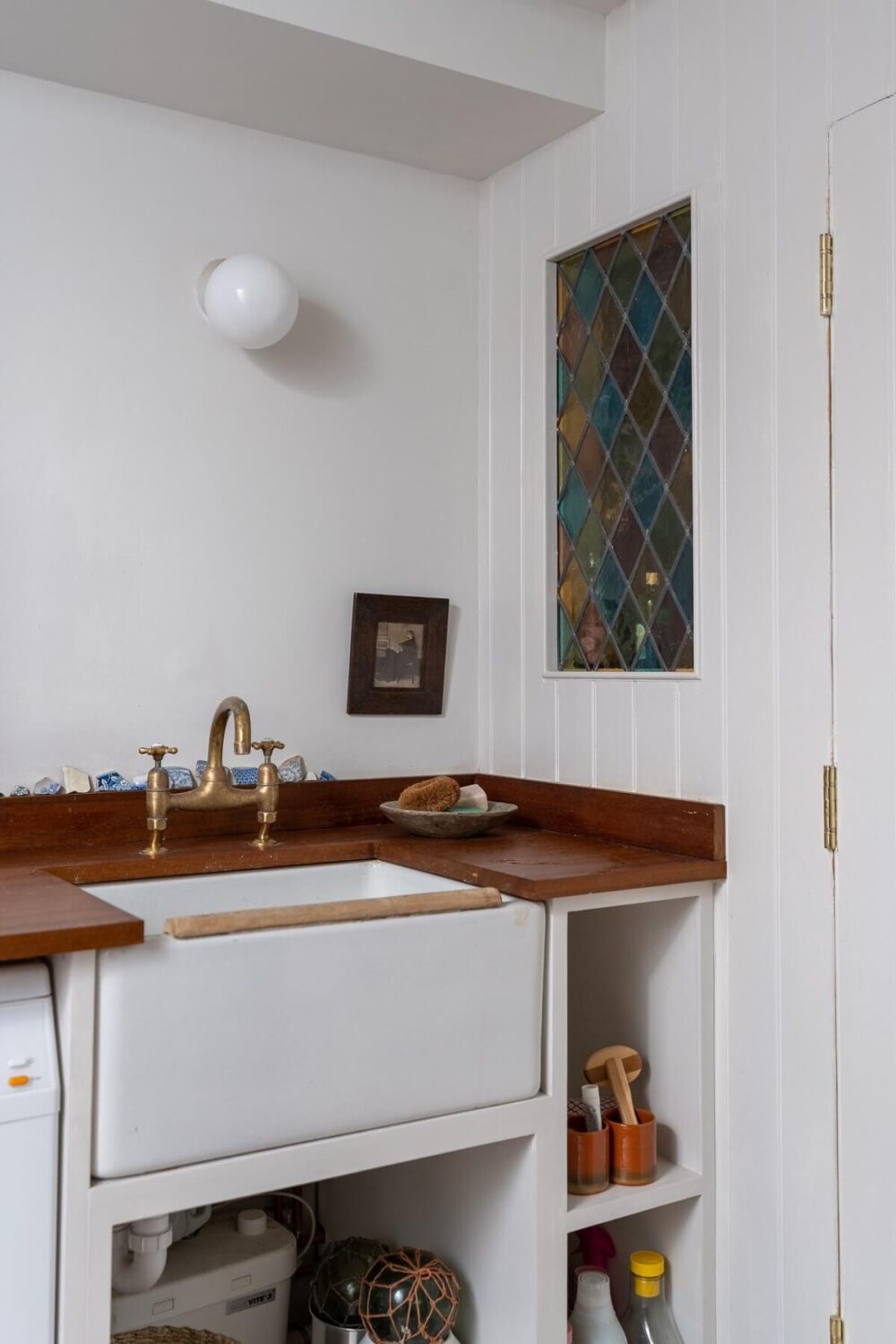A Colorful Historic Family Home in London 16 utility room detail sink