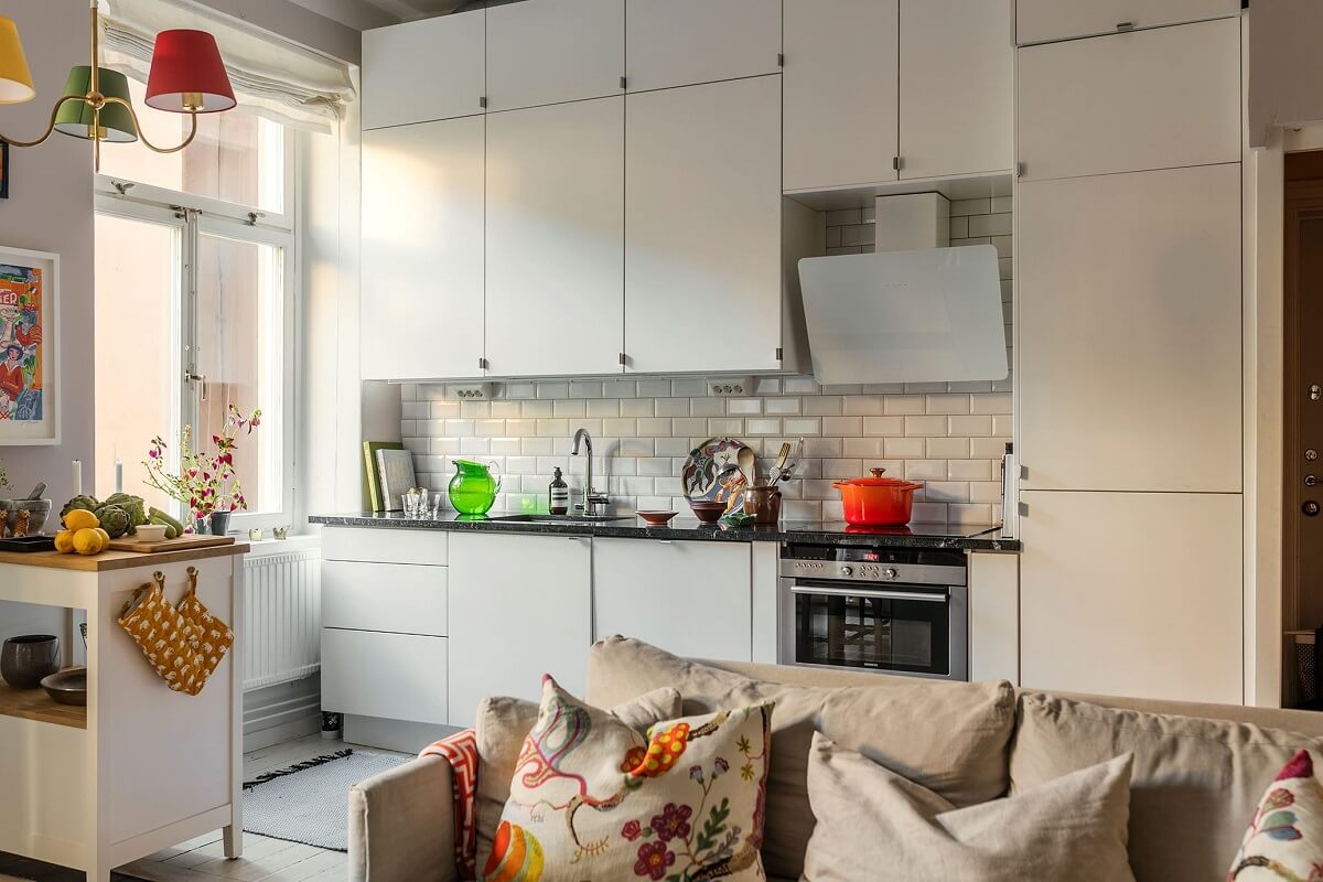 A Small Split-Level Apartment in Stockholm 9 white kitchen