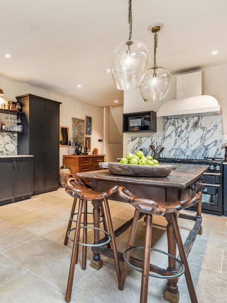 Modern Rustic Interiors in an Edwardian House in London 11 wooden kitchen island marble backsplash