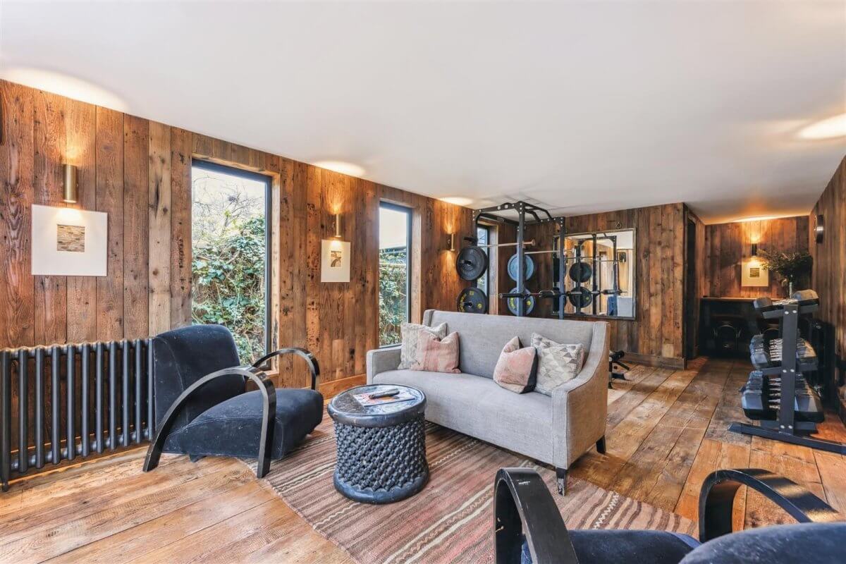 Modern Rustic Interiors in an Edwardian House in London 17 wooden walls home gym