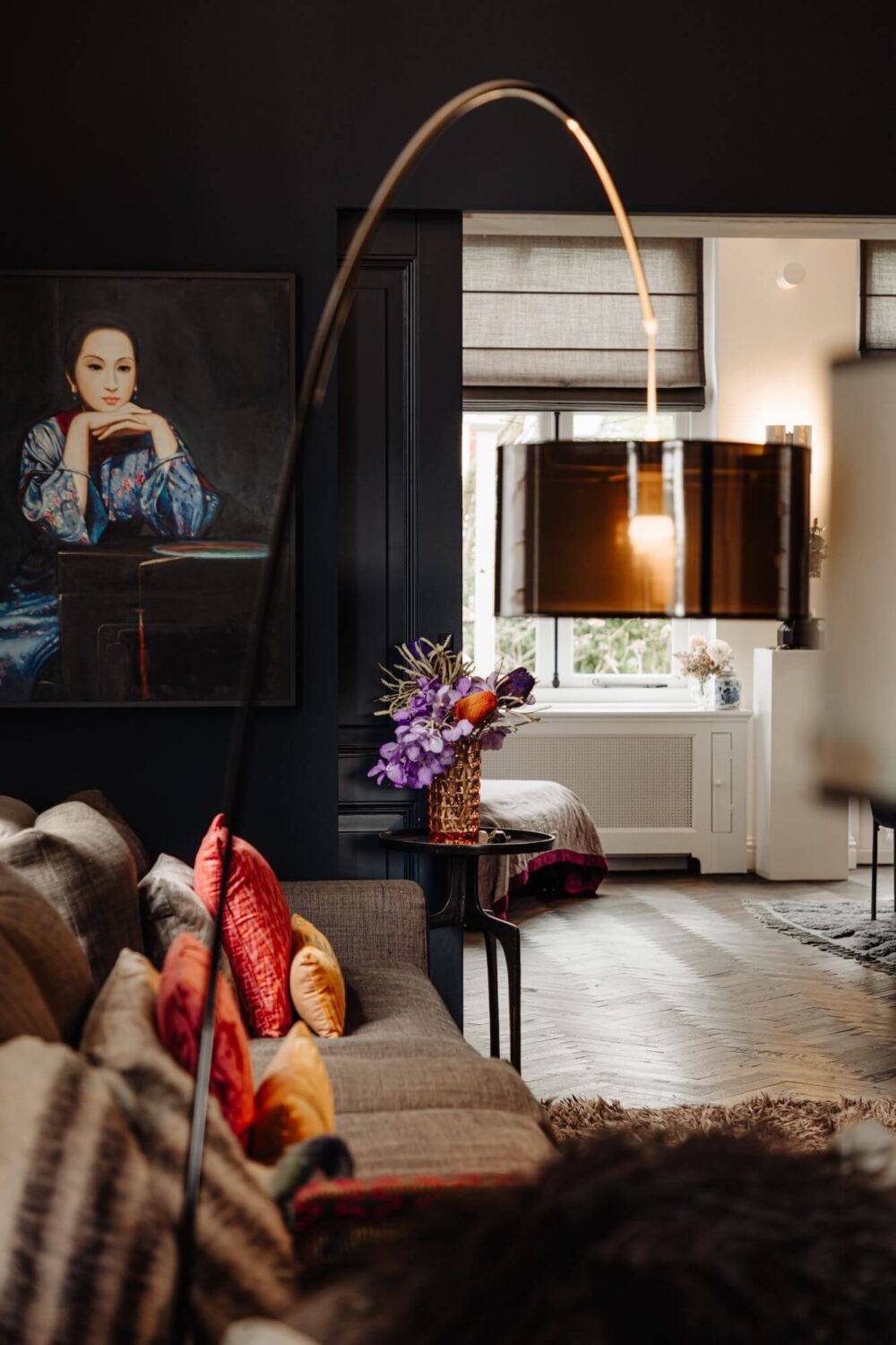 A Beautifully Renovated Dike House in The Netherlands 10 arched floorlamp in living room