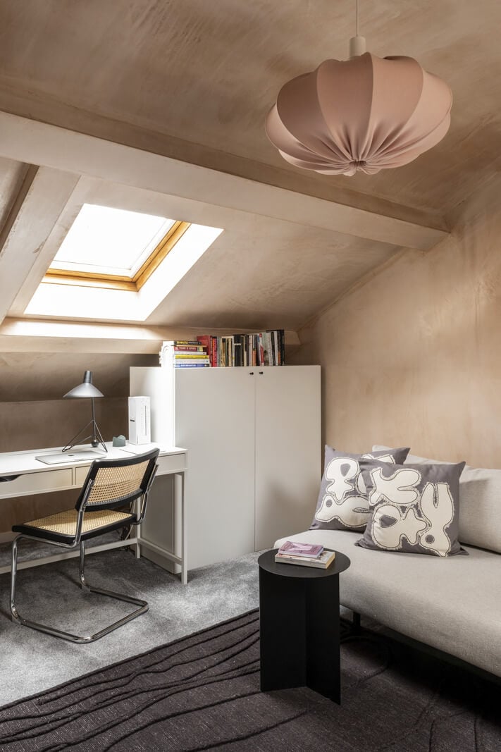 A Modern London Home with Plaster Walls 19 attic bedroom with desk under windows
