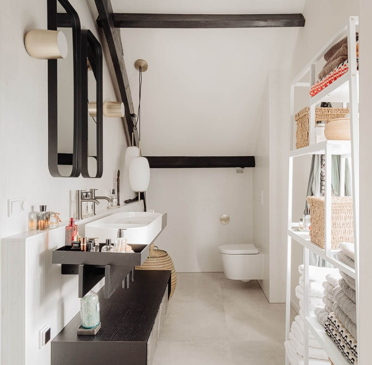 A Beautifully Renovated Dike House in The Netherlands 24 bathroom with exposed beams