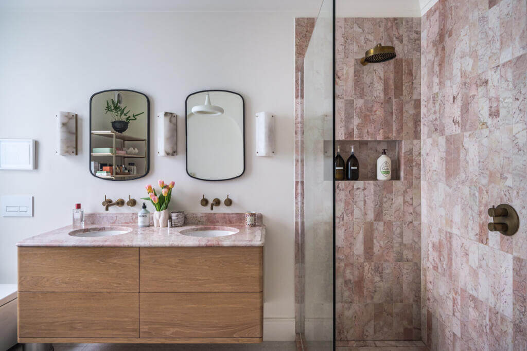 A London House Decorated in Gray and Beige Tones 18 bathroom with pink marble shower tiles