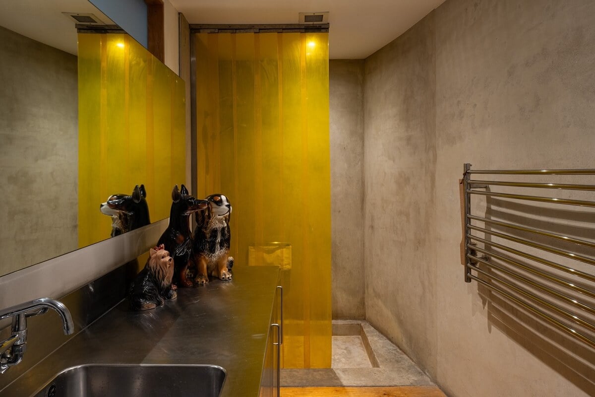 An Industrial English Loft with Yellow Color Pops 16 bathroom with yellow shower wall