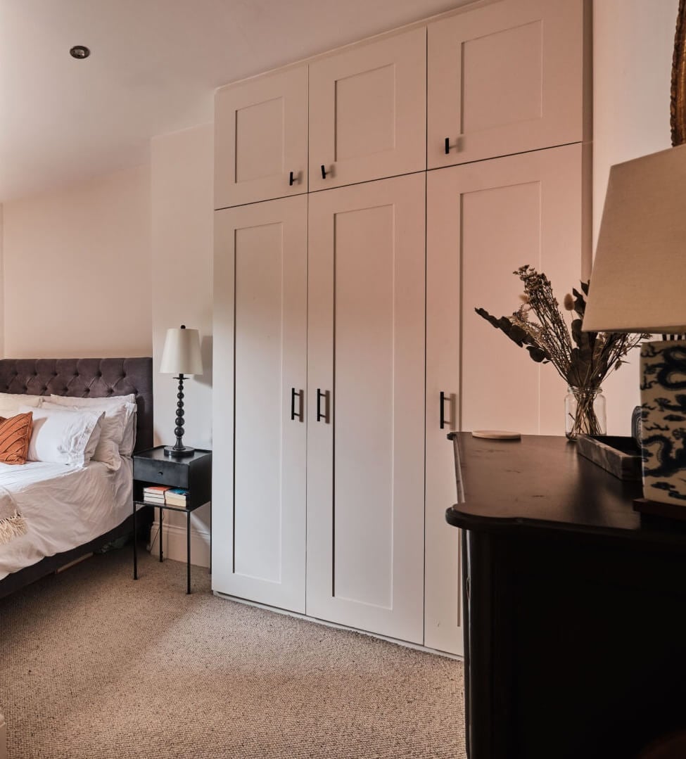 A London Warehouse Conversion with a Black deVOL Kitchen 16 bedroom with built in wardrobes