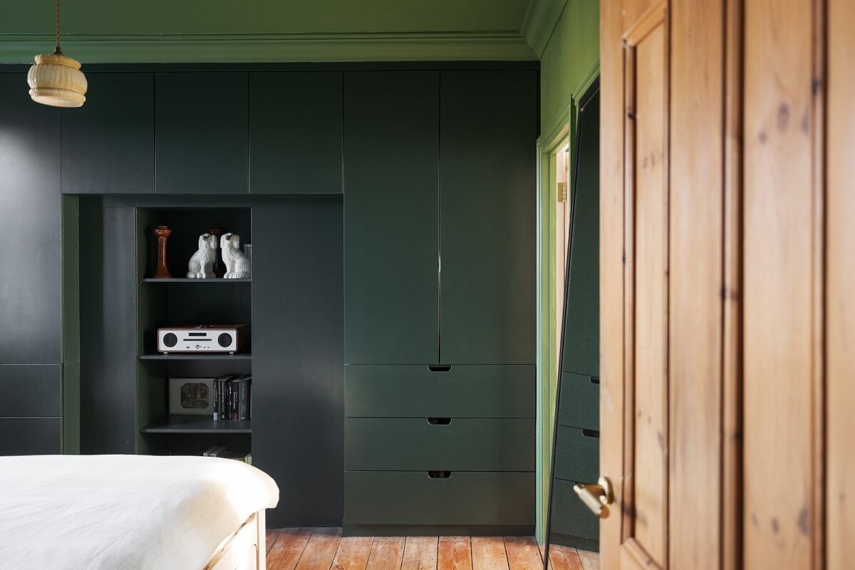 A London Home with Green Color Accents 12 bedroom with green built in wardrobes