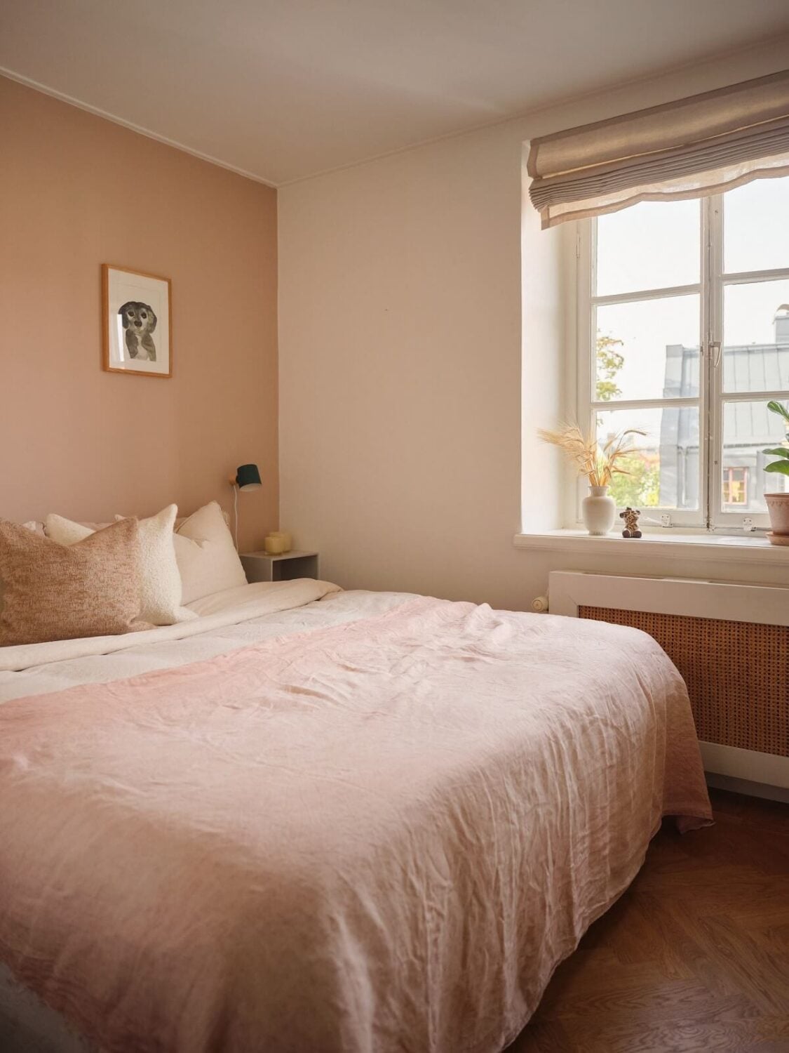A Light Corner Apartment with a Pink Bedroom 16 bedroom with light pink accent wall