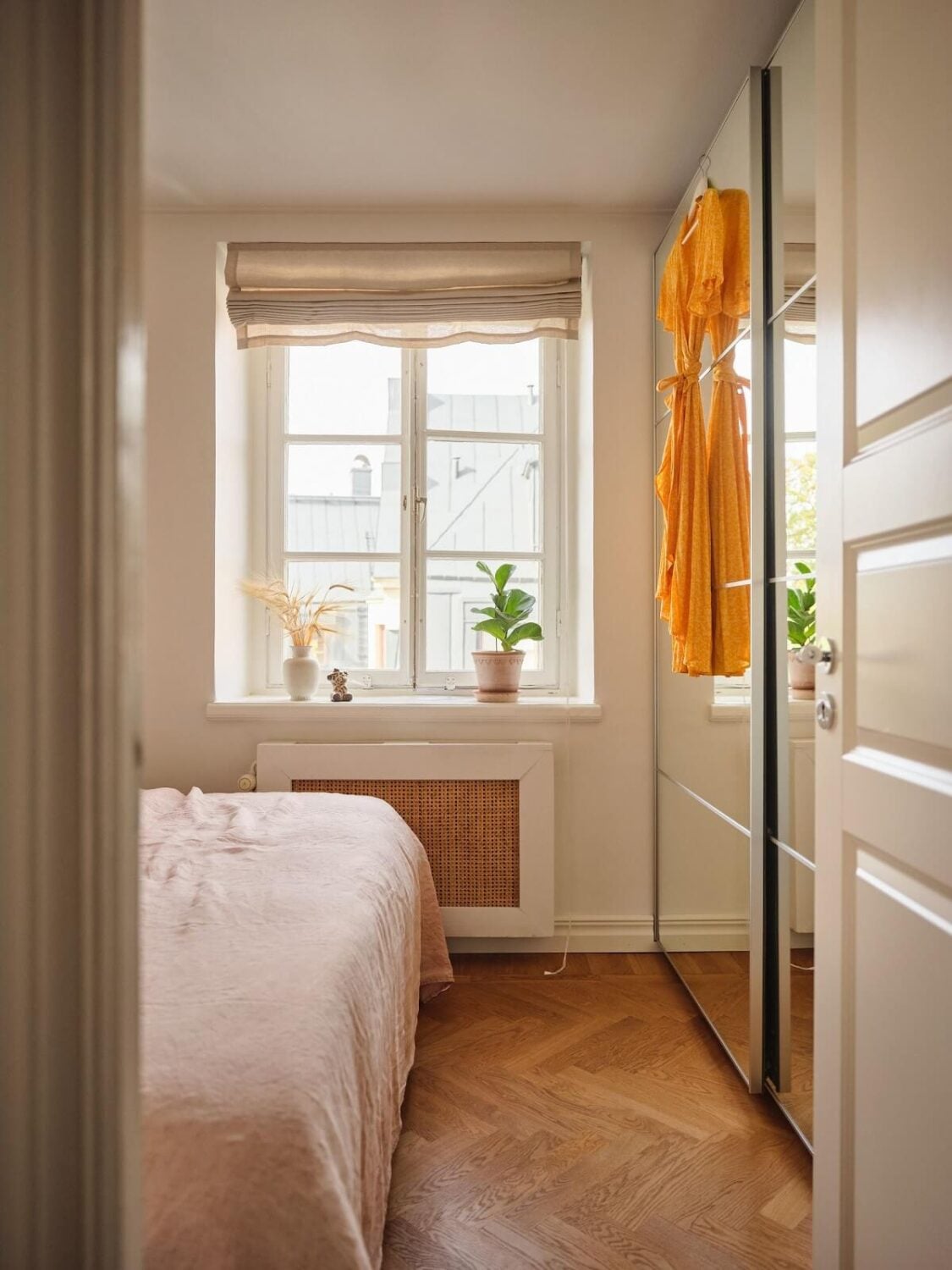 A Light Corner Apartment with a Pink Bedroom 14 bedroom with mirrored wardrobes