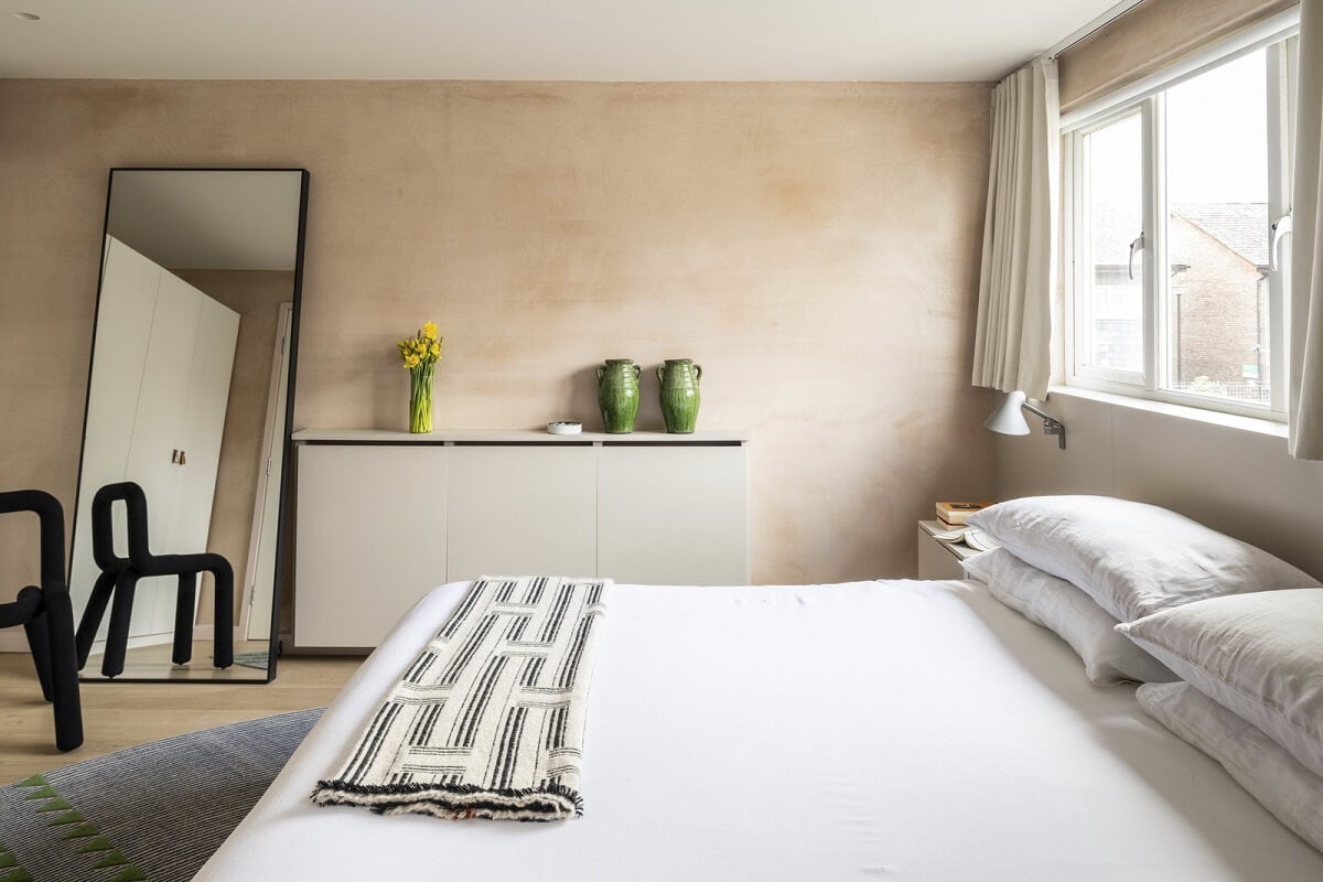 A Modern London Home with Plaster Walls 12 bedroom with plaster walls and floor mirror