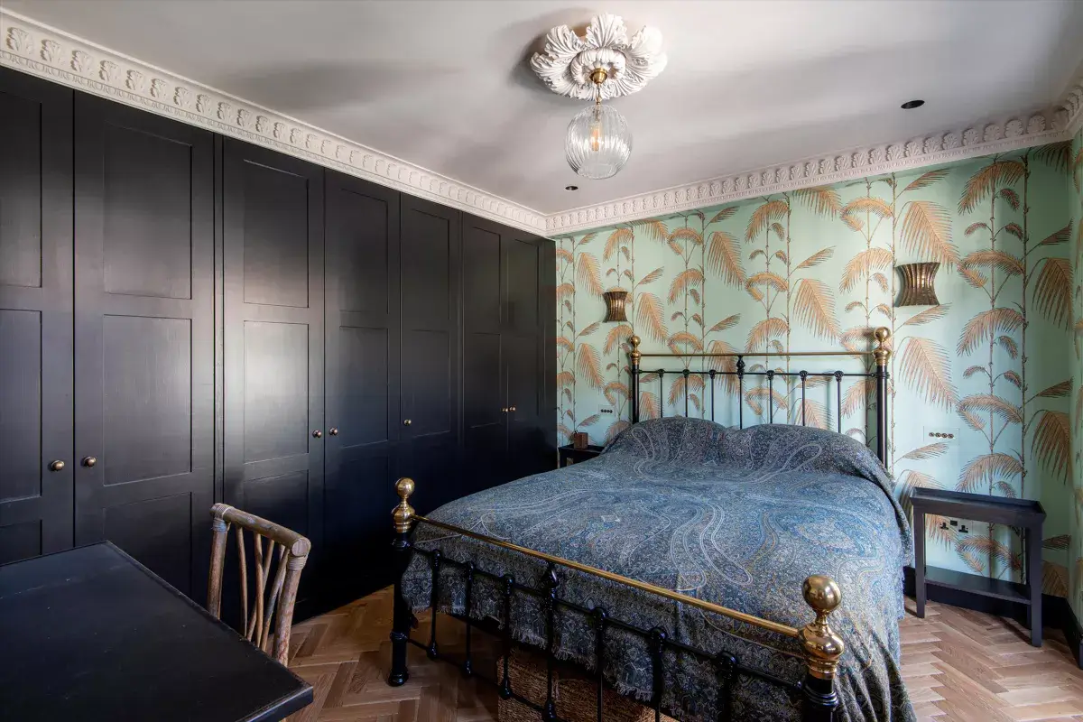 A Stylish Renovated House in Notting Hill 9 bedroom with wallpaper and black built in wardrobes
