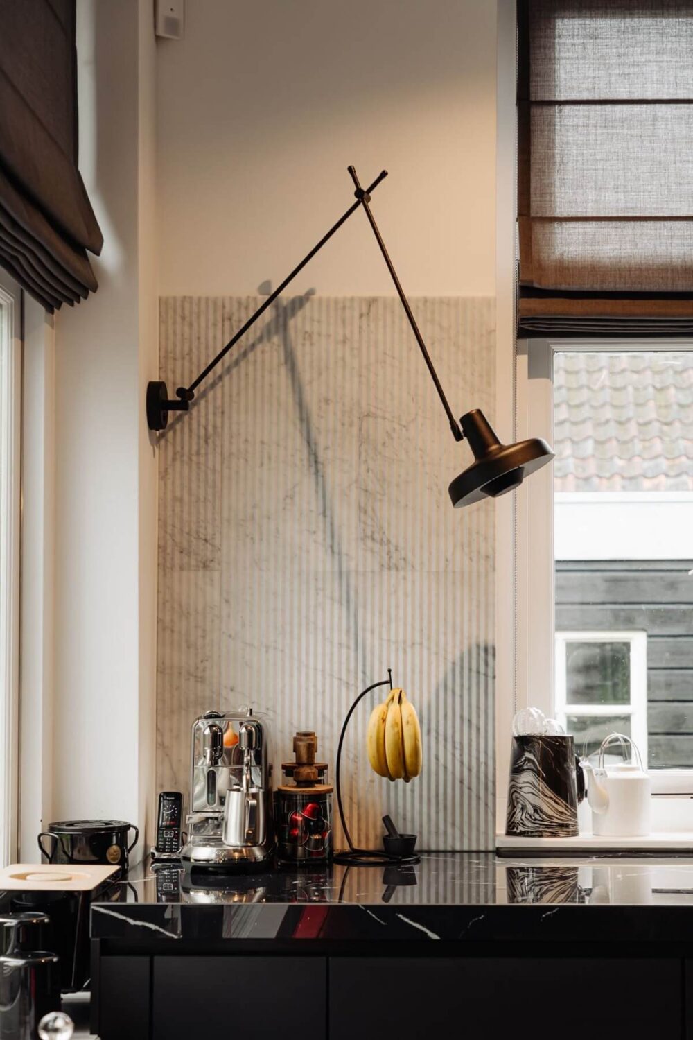 A Beautifully Renovated Dike House in The Netherlands 16 black kitchen detail