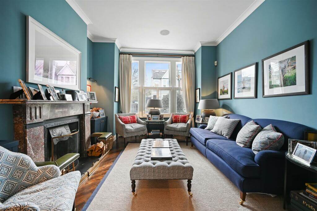 A London Family Home with Blue Color Accents 1 blue living room with fireplace