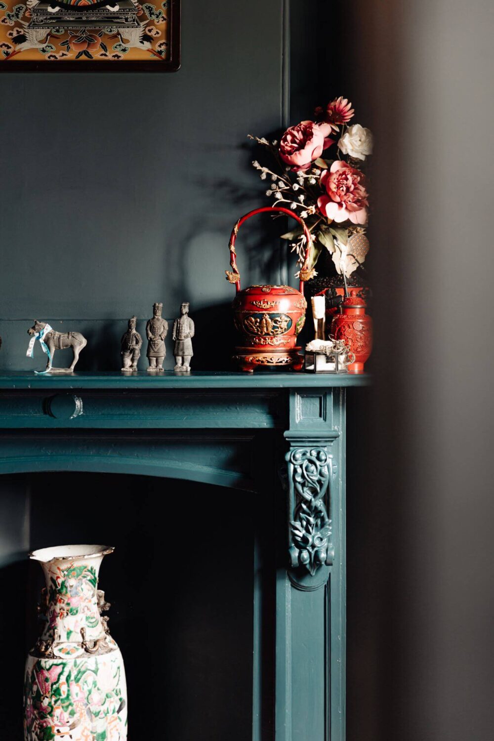 A Beautifully Renovated Dike House in The Netherlands 4 blue painted ornate fireplace