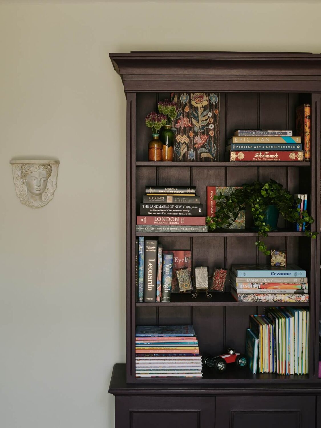Persian and British Influences in a Cotswolds Family Home 3 bookcase-detail