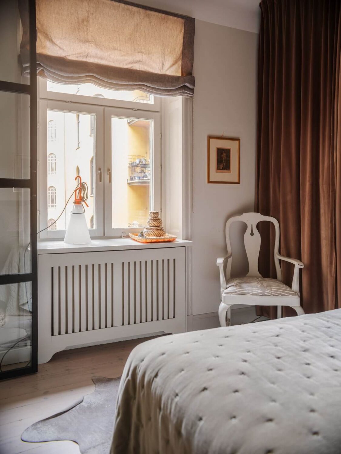 A Muted Color Palette in a Scandinavian Apartment 14 brown tones in bedroom