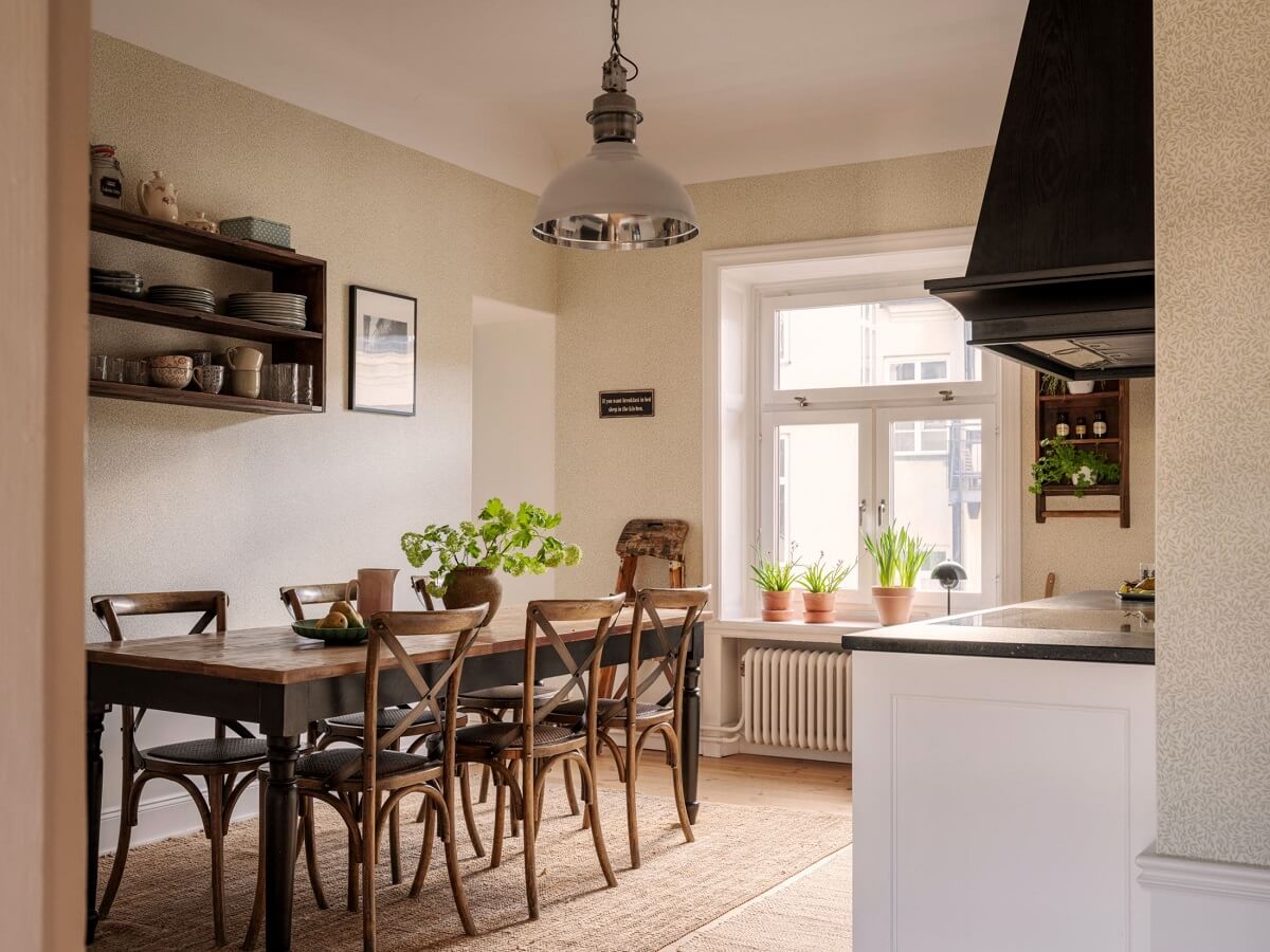 A Classic Swedish Apartment Decorated in Green and Pink Tones 17 classic kitchen with dining table