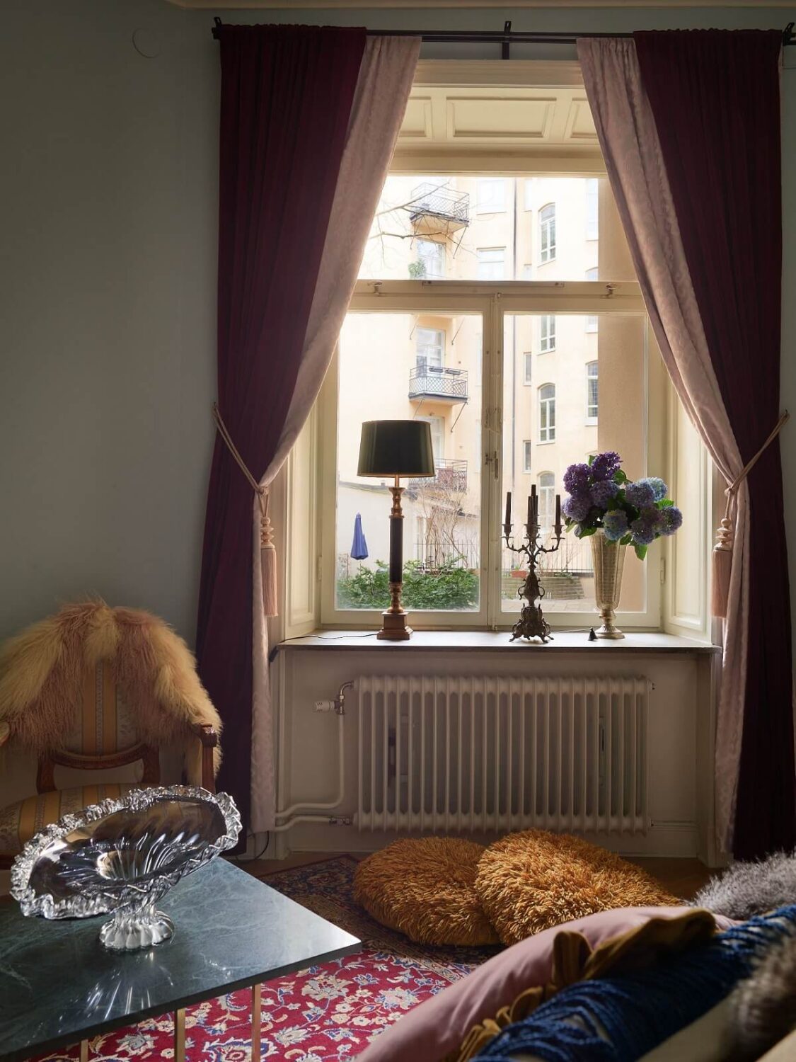 A Classic & Cozy Apartment Painted in Pastel Pink and Blue 6 colorful-living-room