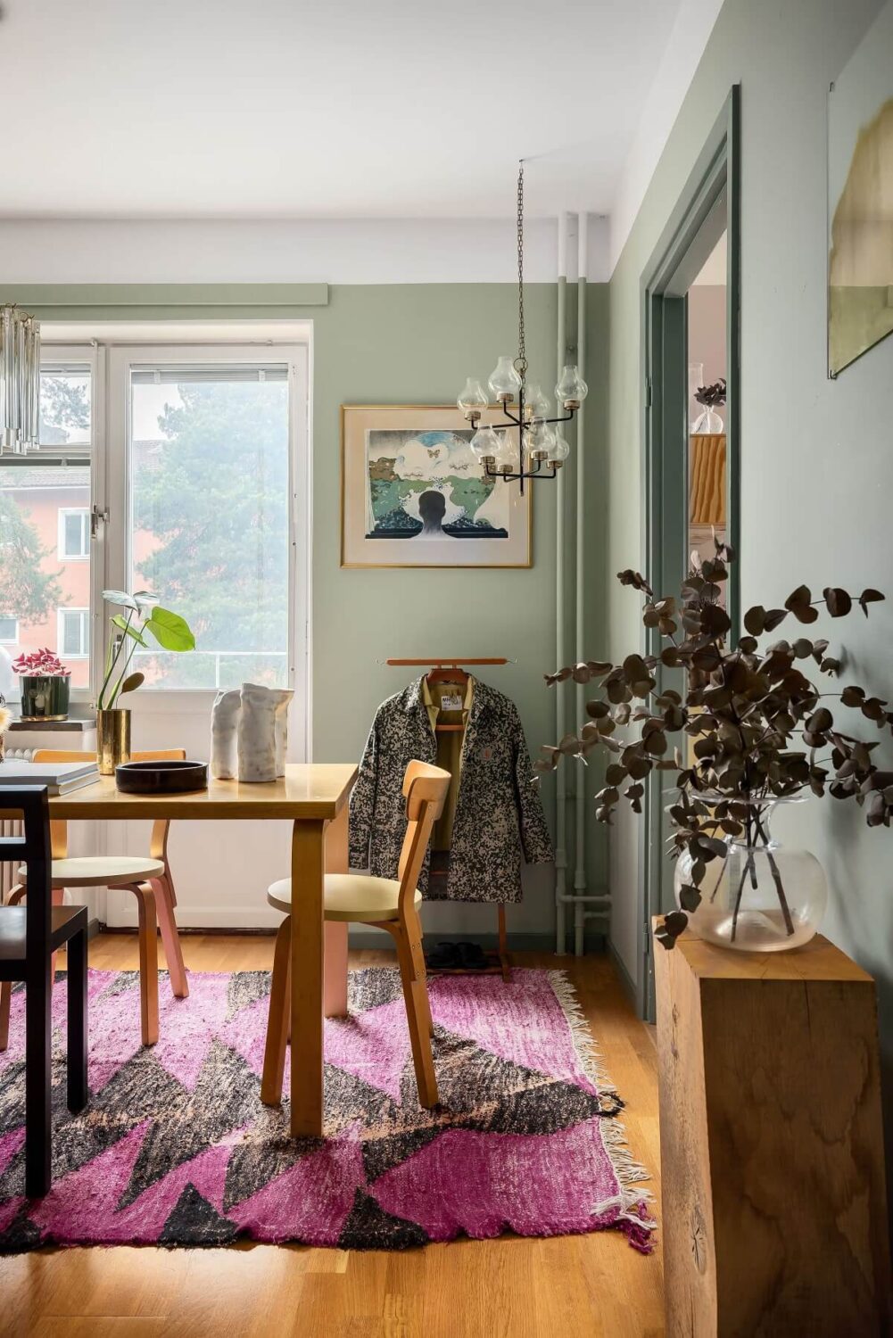 A Cozy Studio Apartment with a Yellow Kitchen 11 colorful rug studio