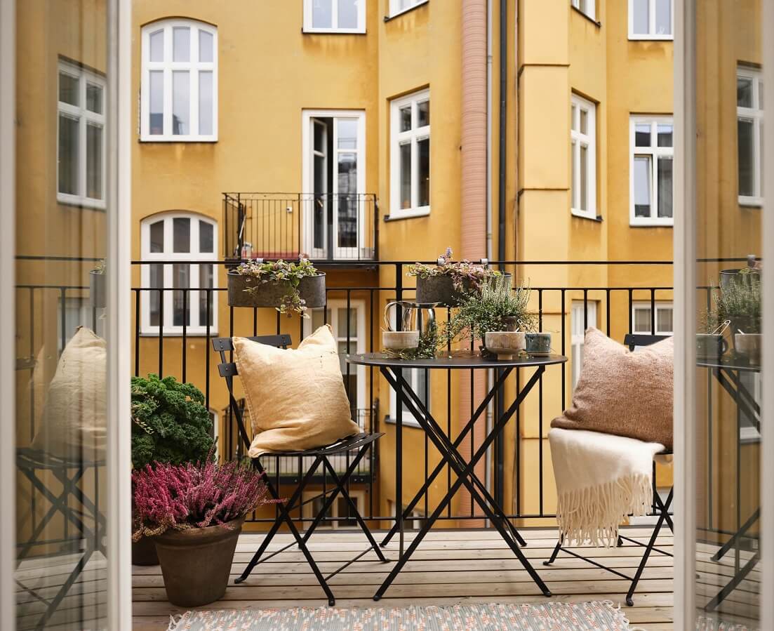 A Light Filled Duplex Apartment in Sweden 31 courtyard balcony