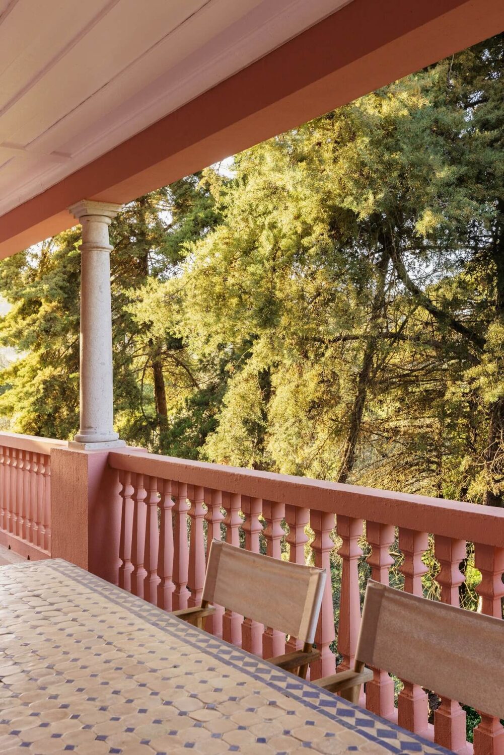 A Renovated Pink Manor House in Portugal 15 covered terrace pink manor house