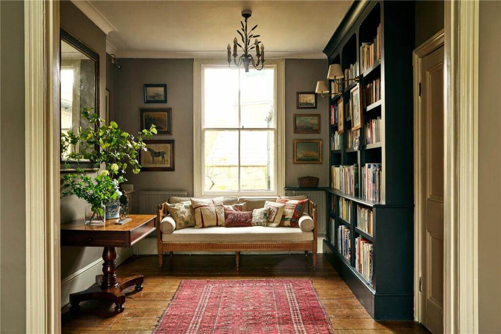 A Warm Muted Color Palette in a Victorian House 9 cozy home library