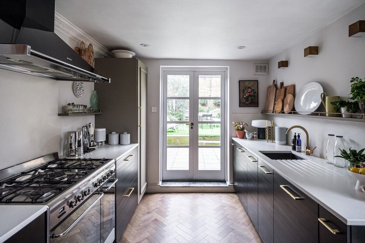 A London House Decorated in Gray and Beige Tones 12 dark galley kitchen with shelves