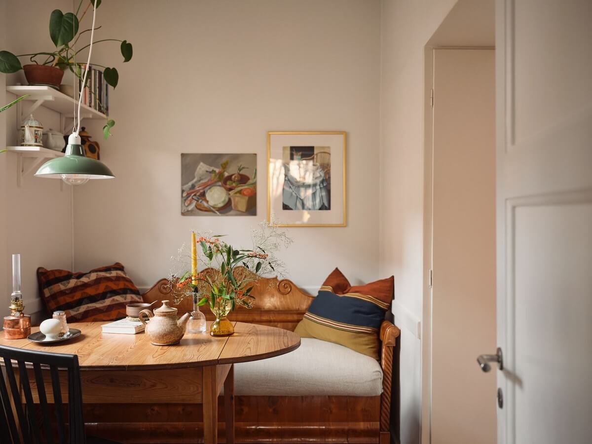 A Small Apartment with a Cozy Dining Nook 5 dining area with wooden bench