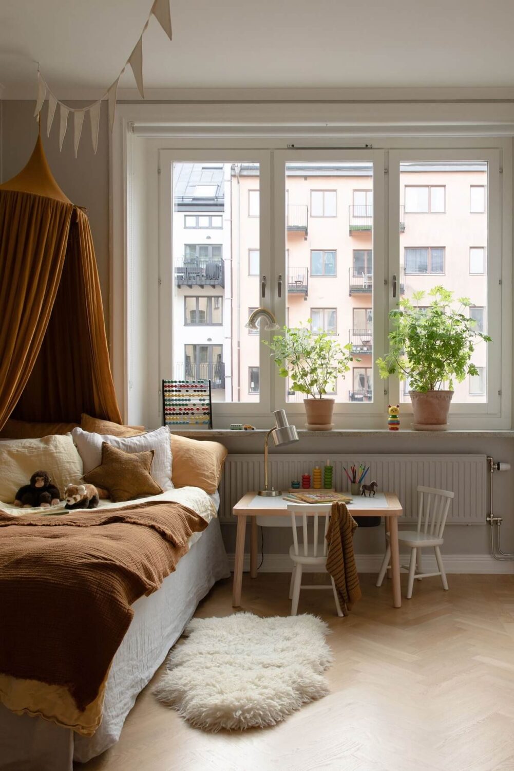 A Light Colored Swedish Apartment 18 earth colored bedding kids bedroom