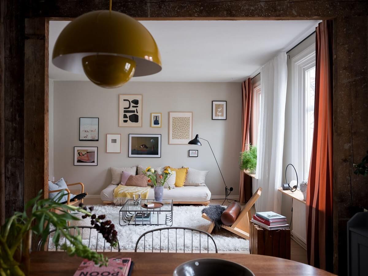 A Beautiful Color Palette in a Scandinavian Family Apartment 1 exposed beams view to living room nordroom