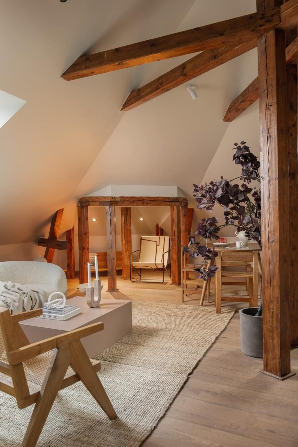 An Attic Apartment in Oslo with Exposed Wooden Beams 5 exposed wooden beams in living room