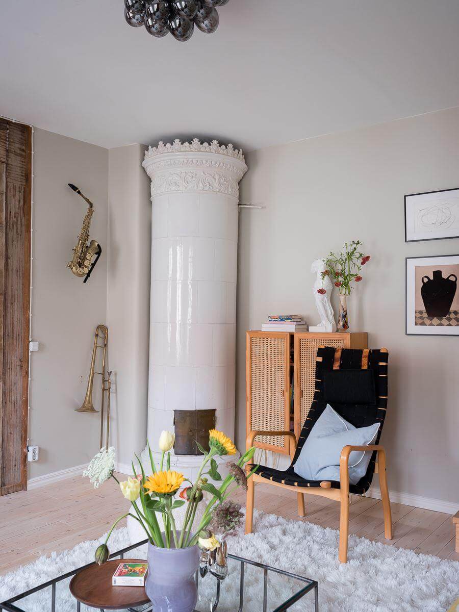 A Beautiful Color Palette in a Scandinavian Family Apartment 21 fireplace in nordic living room