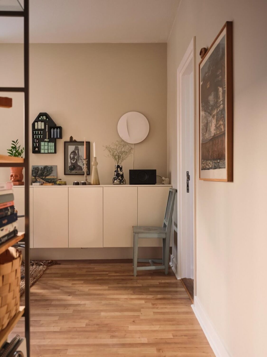 A Small Apartment with a Cozy Dining Nook 4 floating cabinets in living room