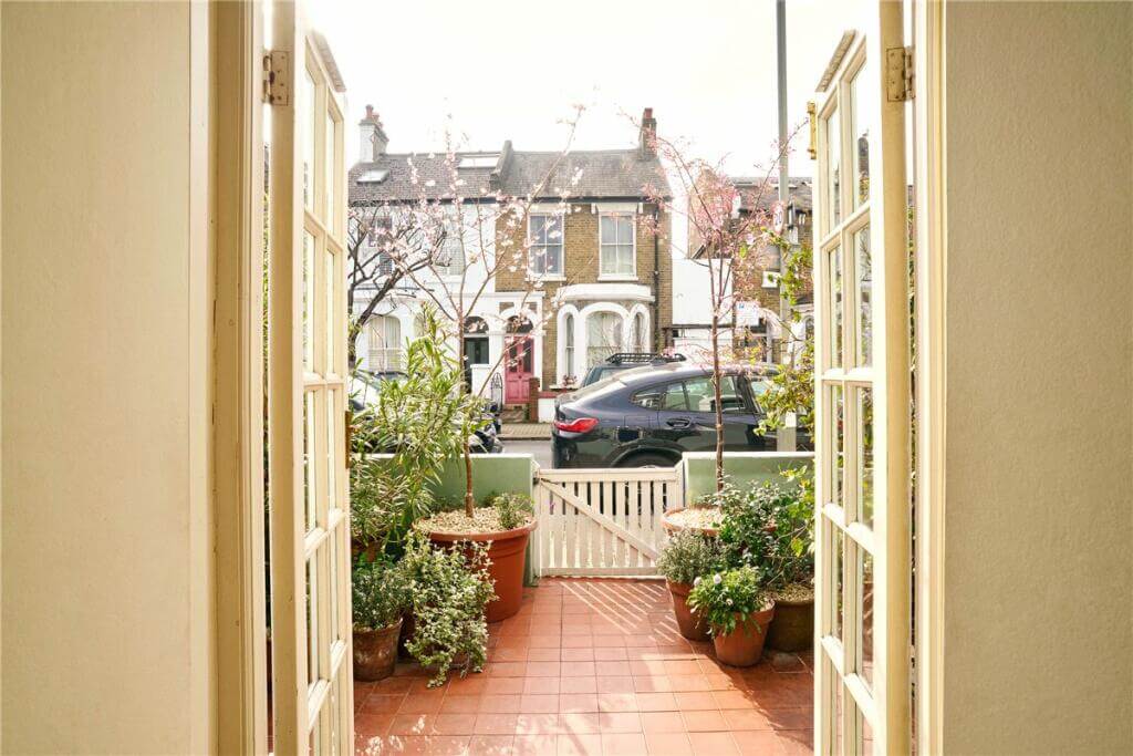 A Warm Muted Color Palette in a Victorian House 37 front garden
