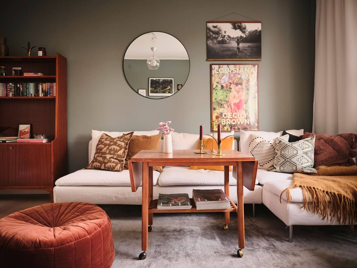 A Small Midcentury Apartment in Stockholm 2 gray walls living room with midcentury design