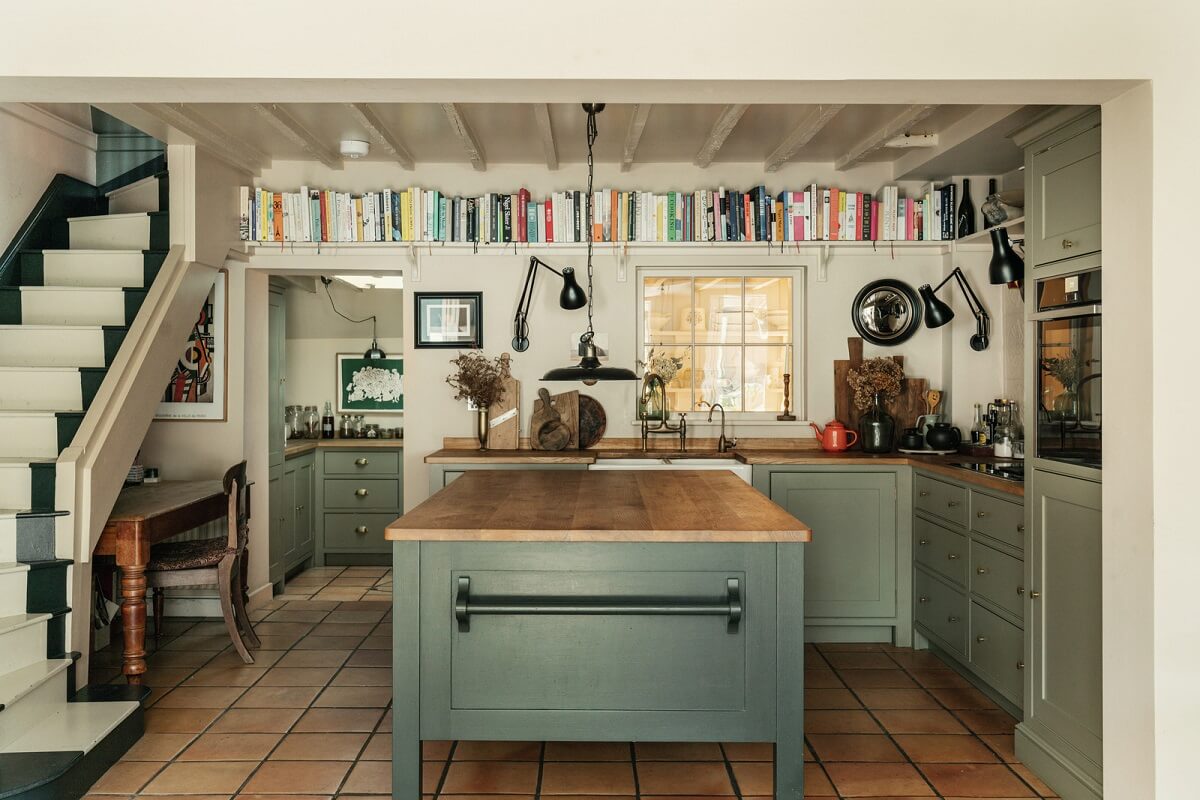 Inviting Colors in a Charming Georgian House in London 11 green kitchen cabinets bookshelves