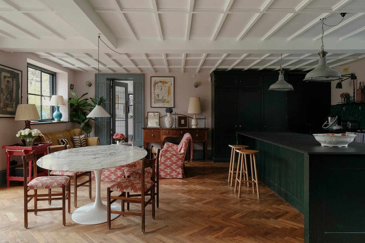 A Barn House with Vintage Decor and Exposed Beams 6 green kitchen