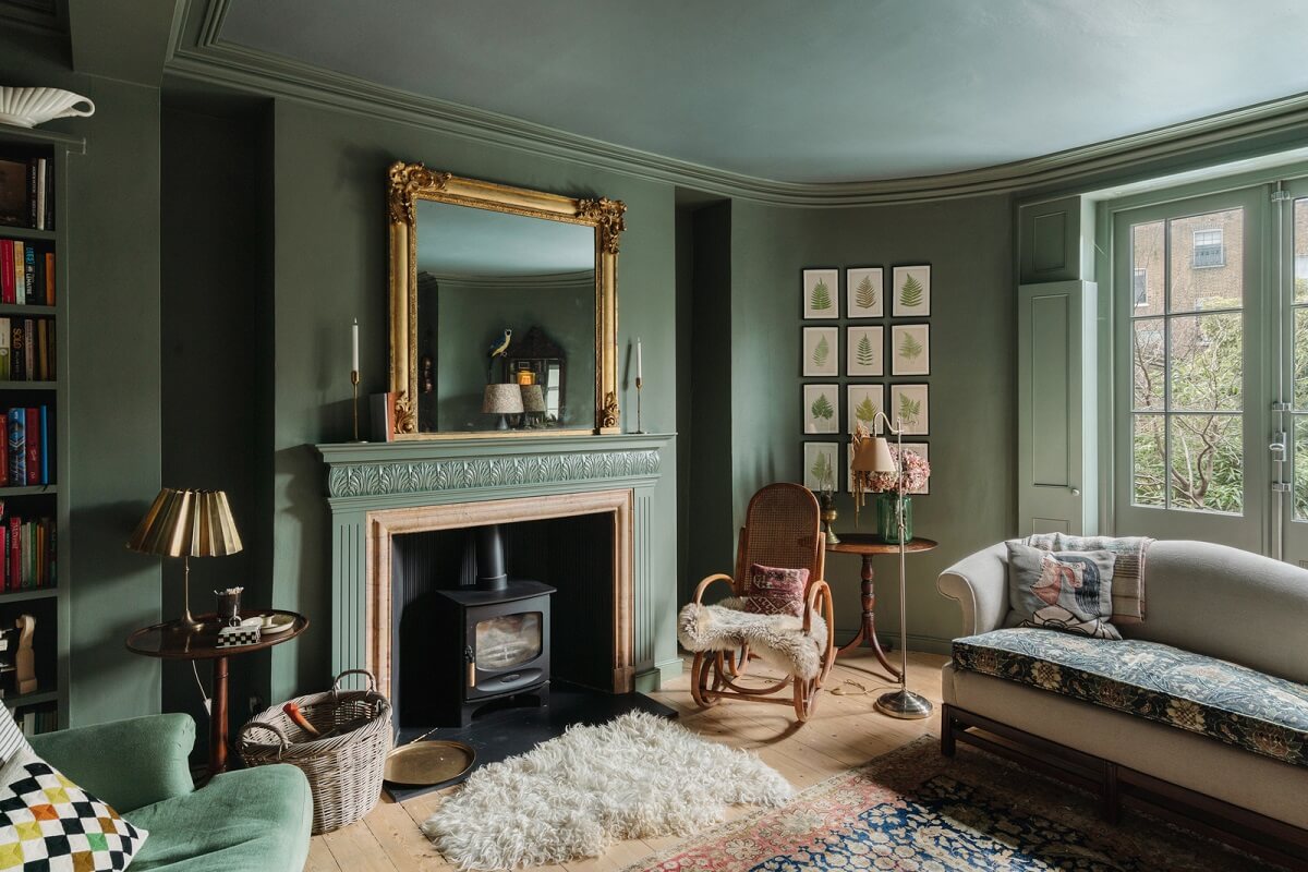 Inviting Colors in a Charming Georgian House in London 2 green living room with fireplace
