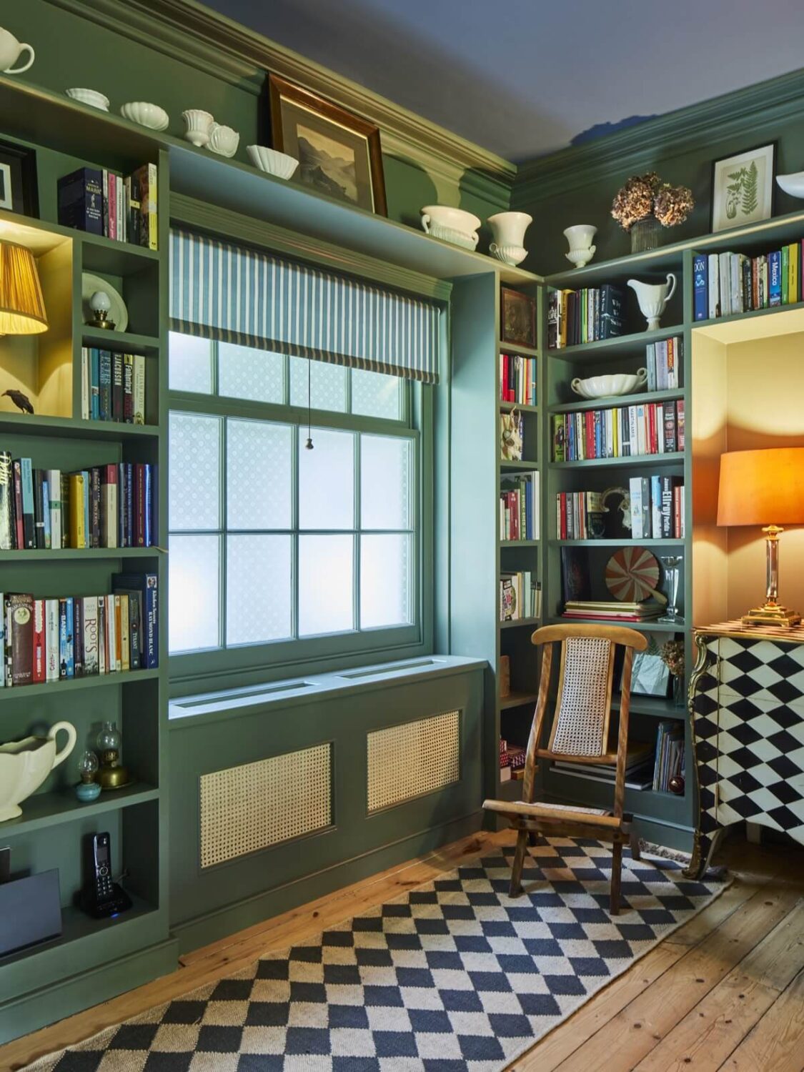 Inviting Colors in a Charming Georgian House in London 5 green room with bookshelves