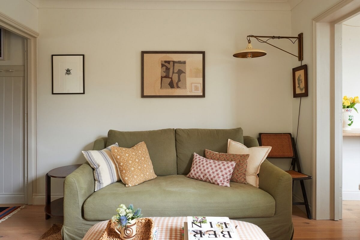 A Small Cottage-Style Apartment in London 4 green sofa in cottage style living room