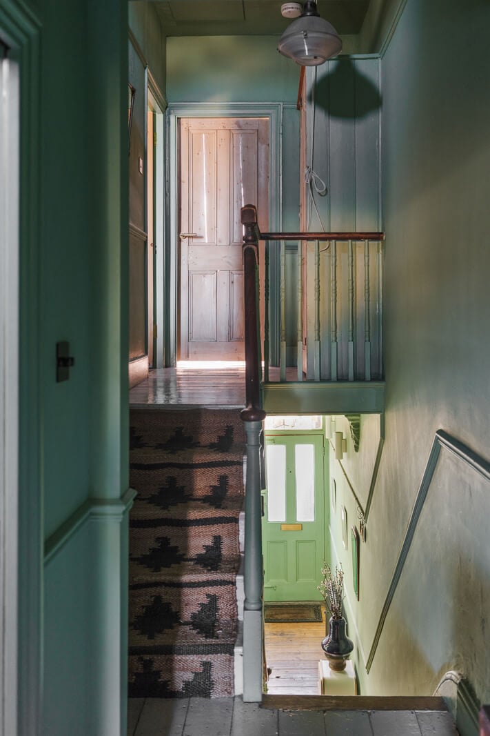 A London Home with Green Color Accents 11 green staircase