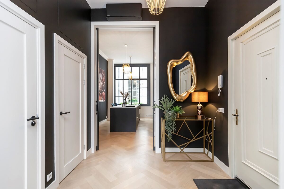 A Renovated Canal House with a Separate Pink Studio Apartment 9 hallway with black walls