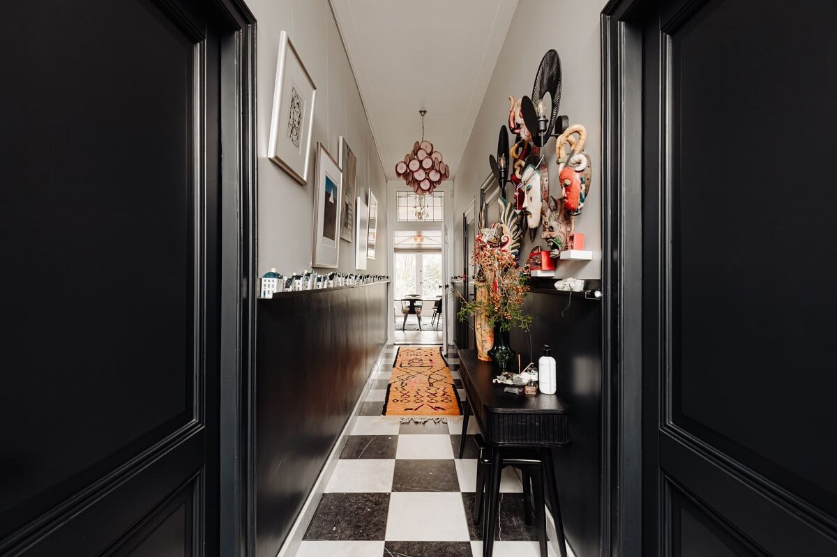A Beautifully Renovated Dike House in The Netherlands 2 hallway with checkerboard floor tiles