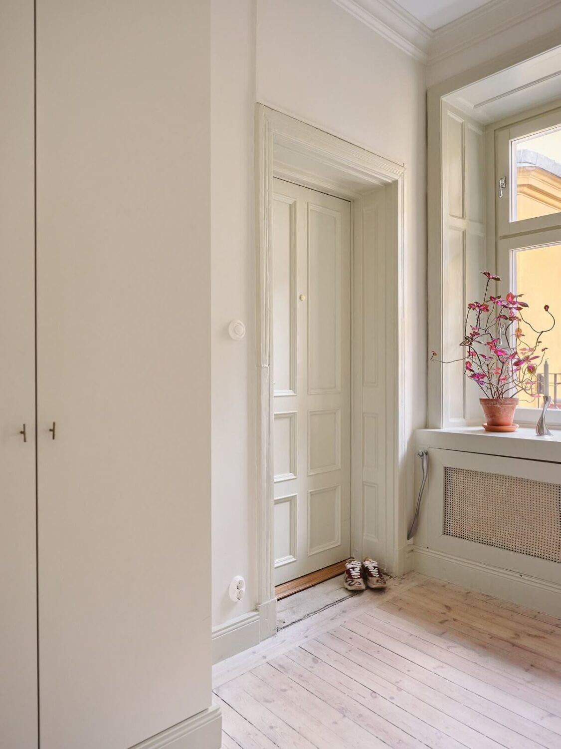 A Light Filled Duplex Apartment in Sweden 30 hallway with wardrobes