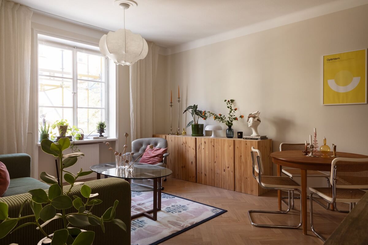 A Renovated Swedish Apartment with a Pink Bathroom 3 ikea ivar cabinets in serene living room