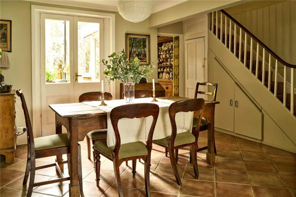 A Warm Muted Color Palette in a Victorian House 18 dining room with stone floor