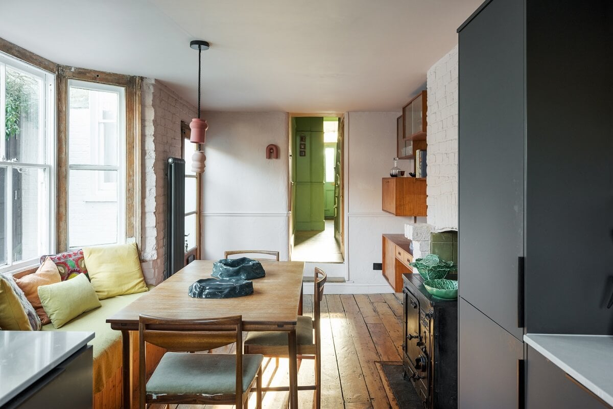 A London Home with Green Color Accents 8 kitchen dining space with window bench