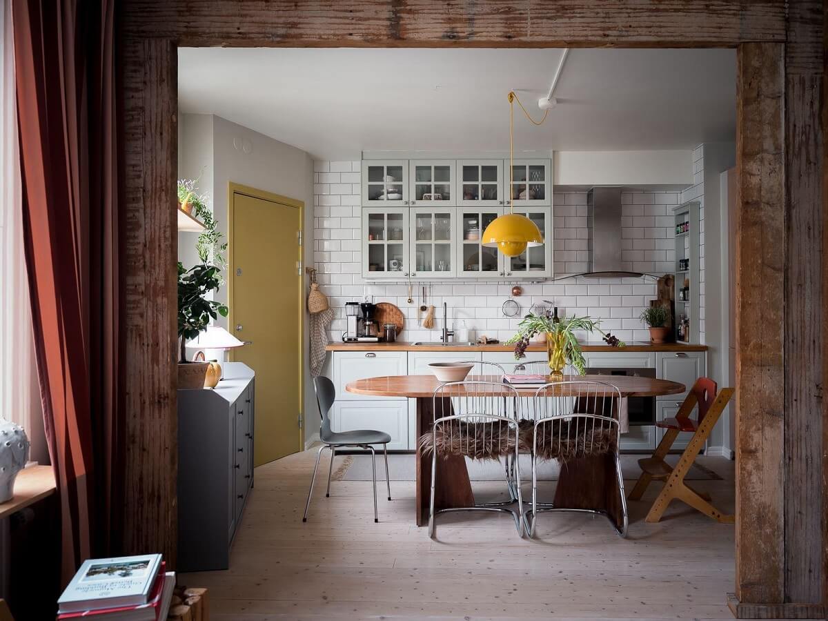 A Beautiful Color Palette in a Scandinavian Family Apartment 2 kitchen exposed wooden beams